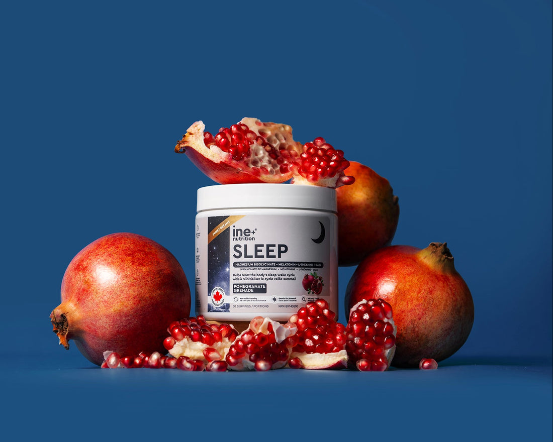 Sleep supplement container with pomegranates on a blue background