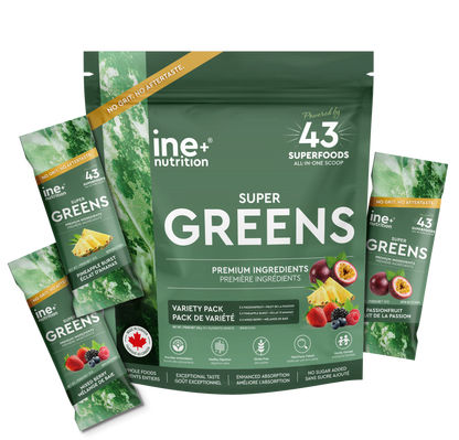 ine+ nutrition Super Greens travel packages with fruit assortment.
